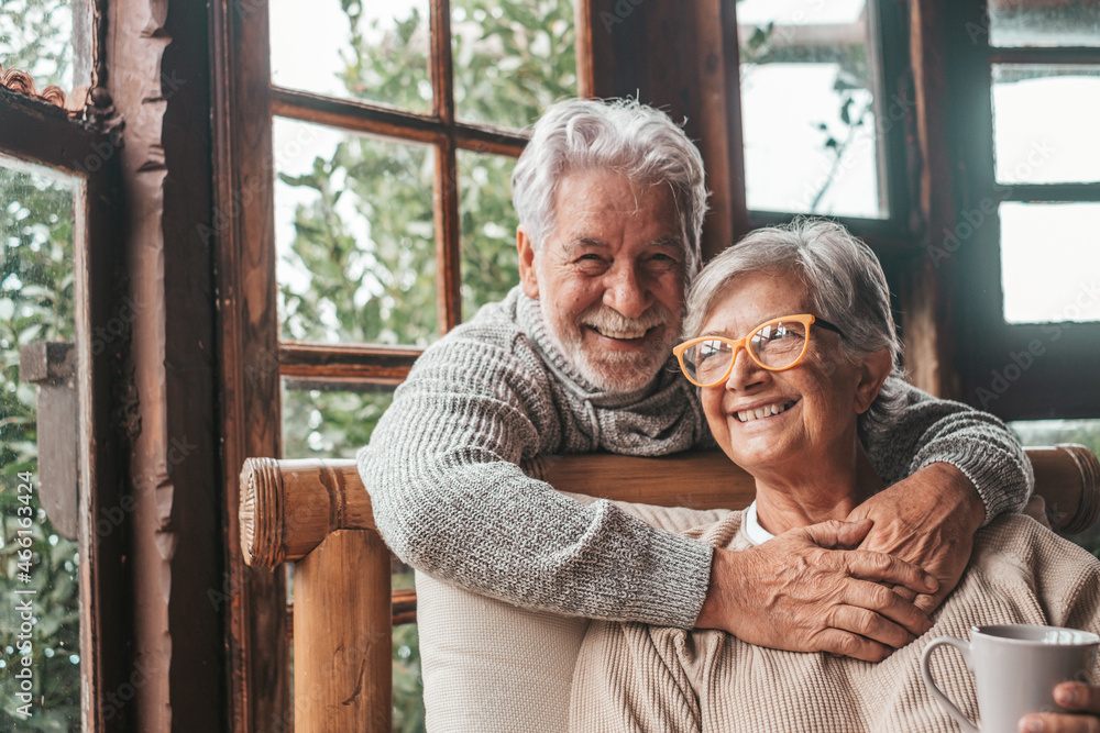 Older couple smiling at home